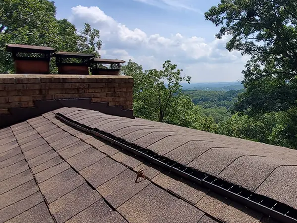 New brown shingles installed on roof